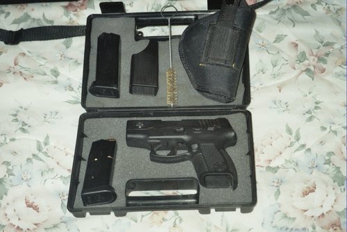 pistol in case showing clips.JPG